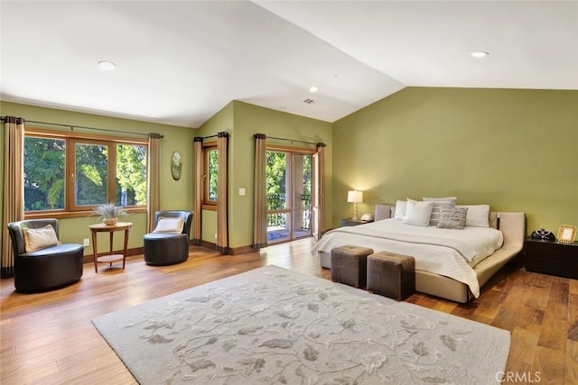24925 Vista Verenda, Woodland Hills, CA 91367 - bedroom featuring lofted ceiling, access to exterior, multiple windows, wood finished floors, and recessed lighting