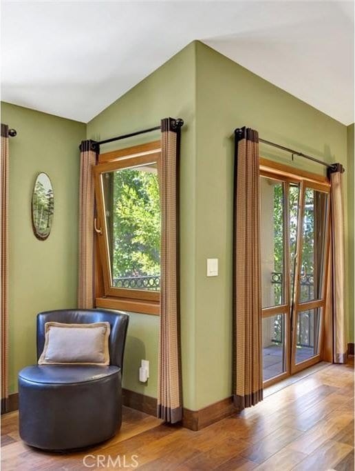 24925 Vista Verenda, Woodland Hills, CA 91367 - doorway featuring healthy amount of natural light, wood finished floors, baseboards, and vaulted ceiling