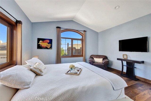 24925 Vista Verenda, Woodland Hills, CA 91367 - bedroom featuring wood finished floors, lofted ceiling, and baseboards