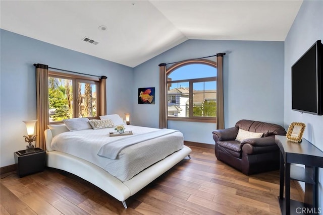 24925 Vista Verenda, Woodland Hills, CA 91367 - bedroom with vaulted ceiling, wood finished floors, multiple windows, and baseboards