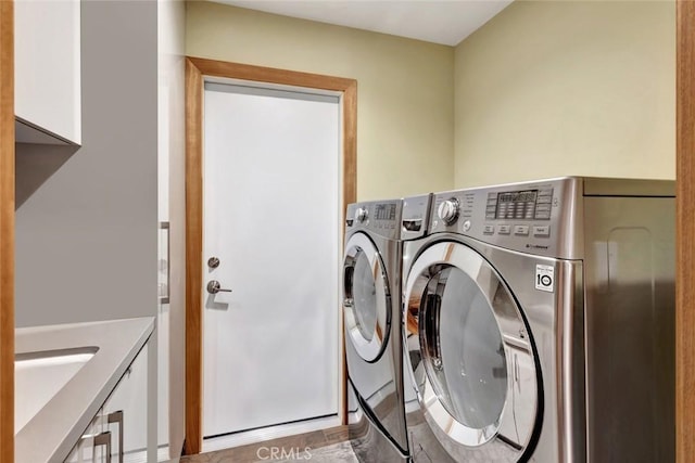 24925 Vista Verenda, Woodland Hills, CA 91367 - clothes washing area featuring cabinet space and washing machine and clothes dryer