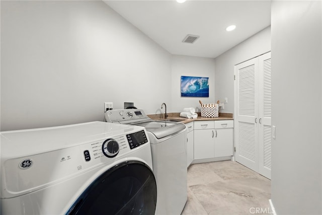 15 Vista De Catalina N, Laguna Beach, CA 92651 - washroom with washing machine and dryer, cabinet space, and recessed lighting