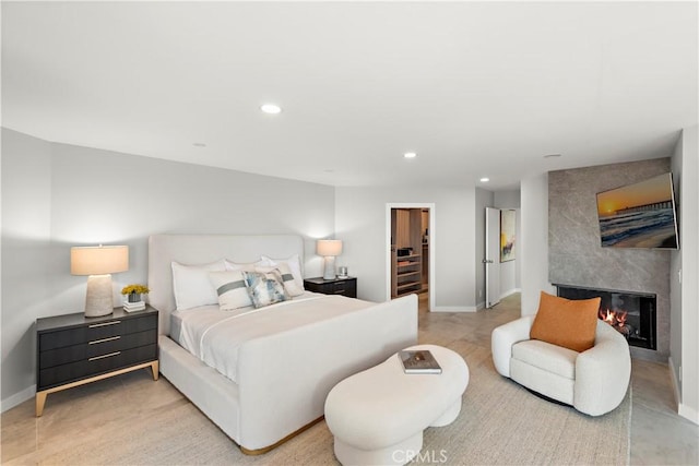 15 Vista De Catalina N, Laguna Beach, CA 92651 - bedroom with recessed lighting, a fireplace, a spacious closet, and baseboards