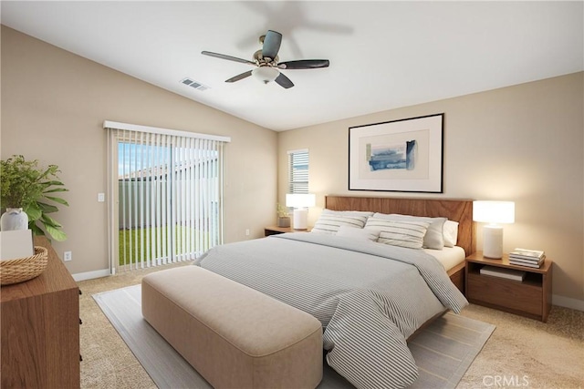 bedroom featuring light colored carpet, visible vents, access to exterior, lofted ceiling, and baseboards