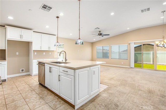 1567 Park Haven Dr, Beaumont, CA 92223 - kitchen featuring a sink, dishwasher, ceiling fan, white cabinetry, and lofted ceiling