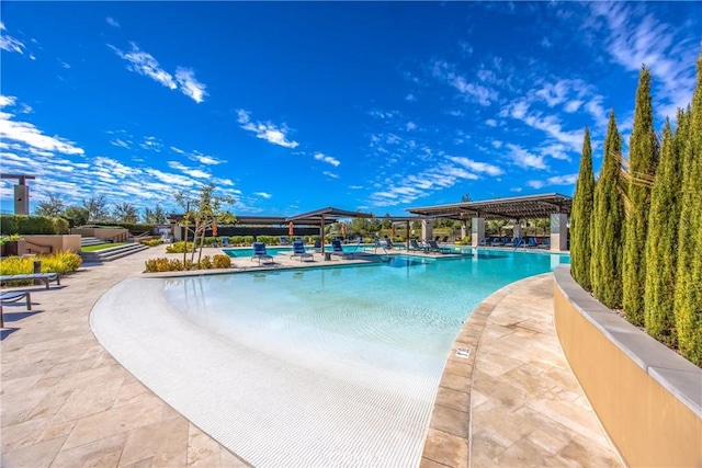pool featuring a patio area