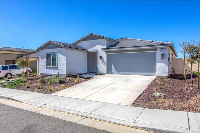 1567 Park Haven Dr, Beaumont, CA 92223 - ranch-style home with a garage, stucco siding, a tile roof, and concrete driveway