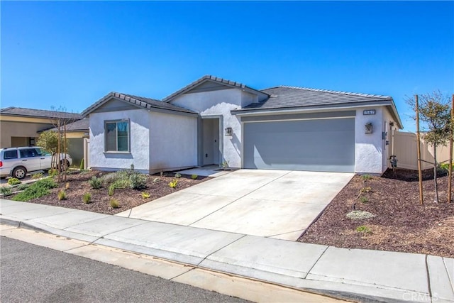 1567 Park Haven Dr, Beaumont, CA 92223 - ranch-style house with an attached garage, stucco siding, a tile roof, and driveway