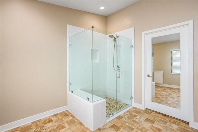 1567 Park Haven Dr, Beaumont, CA 92223 - full bathroom with a shower stall and baseboards