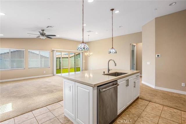 kitchen with light colored carpet, a sink, light tile patterned floors, and stainless steel dishwasher