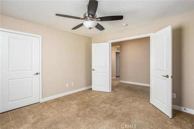 1567 Park Haven Dr, Beaumont, CA 92223 - unfurnished bedroom featuring light carpet and a ceiling fan