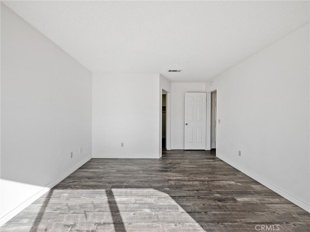 19246 Pine Way, Apple Valley, CA 92308 - spare room with wood finished floors and baseboards