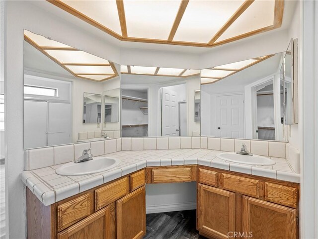 19246 Pine Way, Apple Valley, CA 92308 - full bathroom featuring double vanity and wood finished floors
