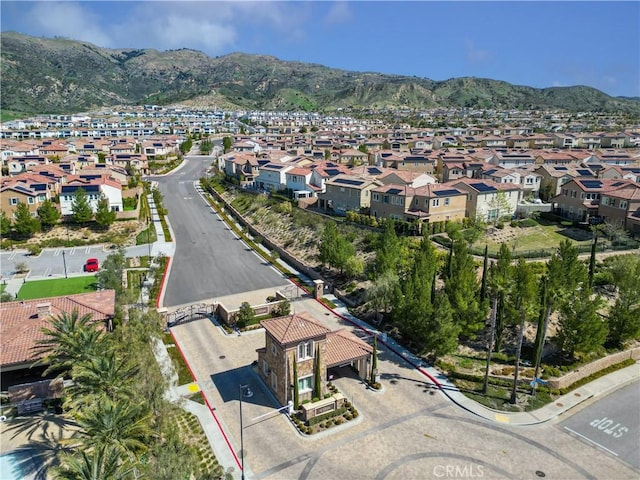 bird's eye view with a residential view and a mountain view