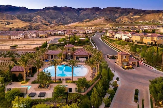 bird's eye view featuring a residential view and a mountain view