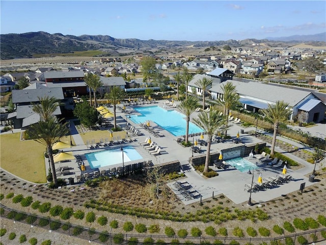bird's eye view featuring a residential view and a mountain view