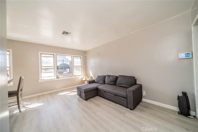 541 Elm Ave, Inglewood, CA 90301 - living room with visible vents, baseboards, and wood finished floors