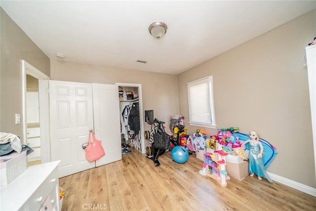 541 Elm Ave, Inglewood, CA 90301 - playroom featuring visible vents, baseboards, and wood finished floors