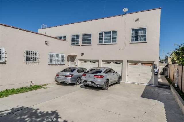 541 Elm Ave, Inglewood, CA 90301 - exterior space with a gate, an attached garage, driveway, and fence