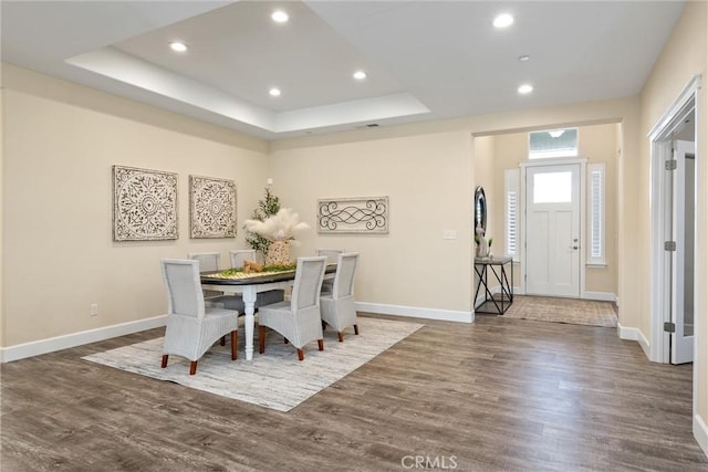dining area with recessed lighting, wood finished floors, and baseboards