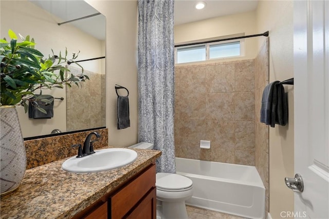 full bath featuring shower / tub combo, vanity, and toilet