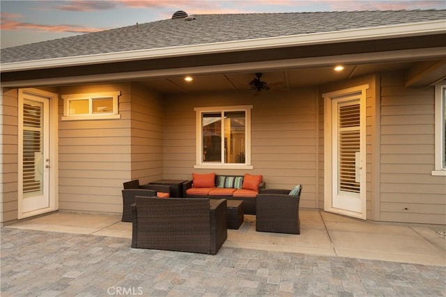 view of patio / terrace featuring an outdoor living space and ceiling fan