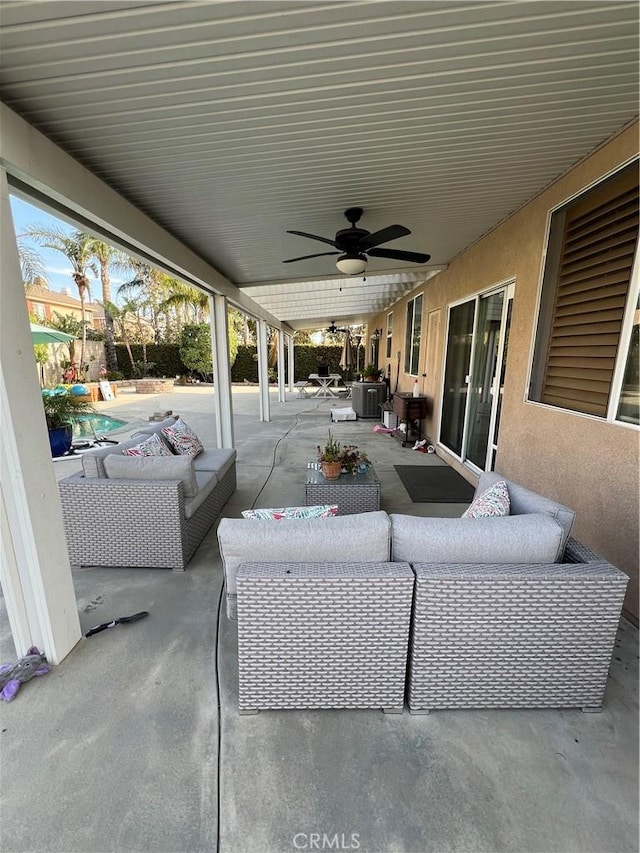 view of patio / terrace with outdoor lounge area and ceiling fan