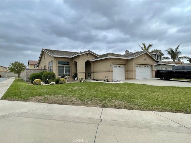 ranch-style house with driveway, stucco siding, a front yard, and an attached garage