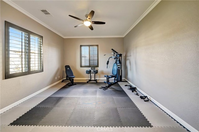 workout room with visible vents, ceiling fan, ornamental molding, and baseboards