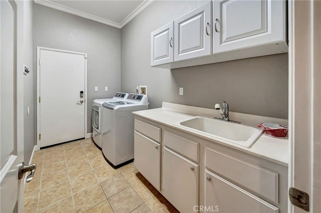 laundry area with light tile patterned floors, independent washer and dryer, a sink, ornamental molding, and cabinet space