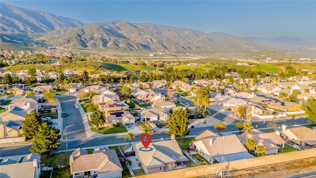 bird's eye view featuring a mountain view and a residential view