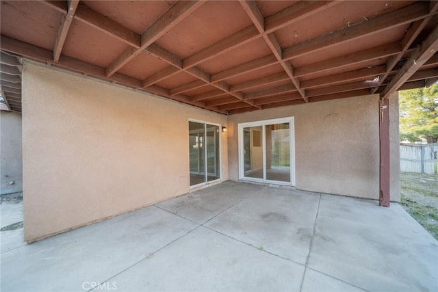 view of patio / terrace featuring fence