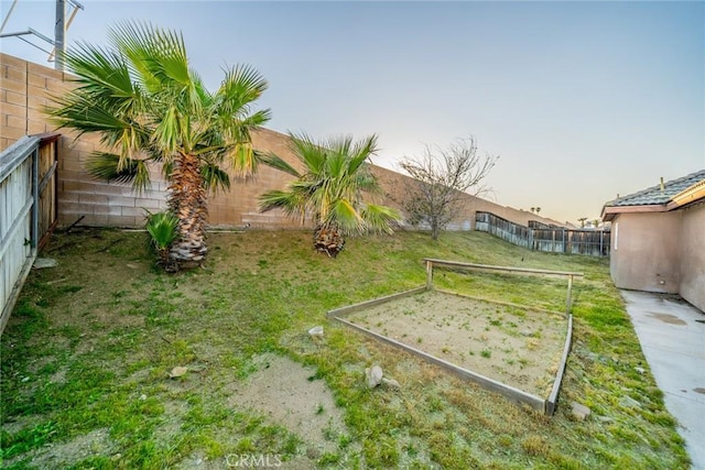 view of yard featuring a fenced backyard