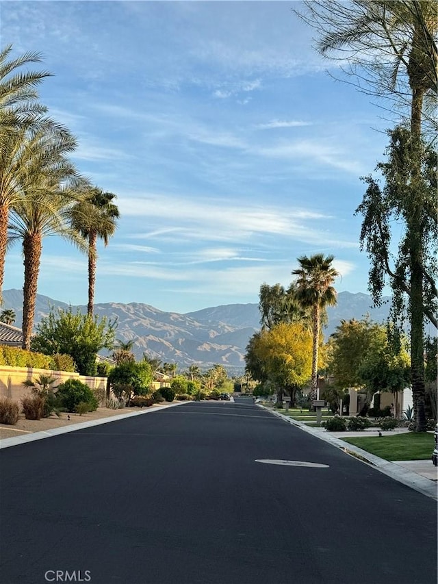 233 Lake Shore Dr, Rancho Mirage, CA 92270 - view of asphalt street with a mountain view and curbs