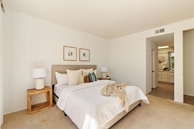 233 Lake Shore Dr, Rancho Mirage, CA 92270 - bedroom featuring light colored carpet, baseboards, and connected bathroom