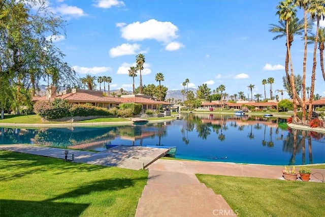 233 Lake Shore Dr, Rancho Mirage, CA 92270 - exterior space featuring a water view, a yard, and a dock