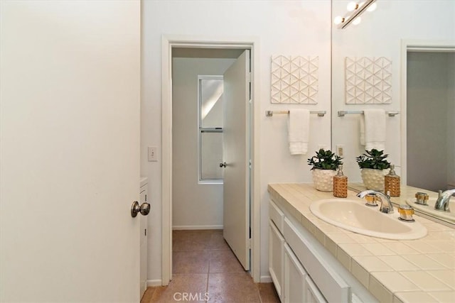 233 Lake Shore Dr, Rancho Mirage, CA 92270 - bathroom with vanity, tile patterned floors, and baseboards