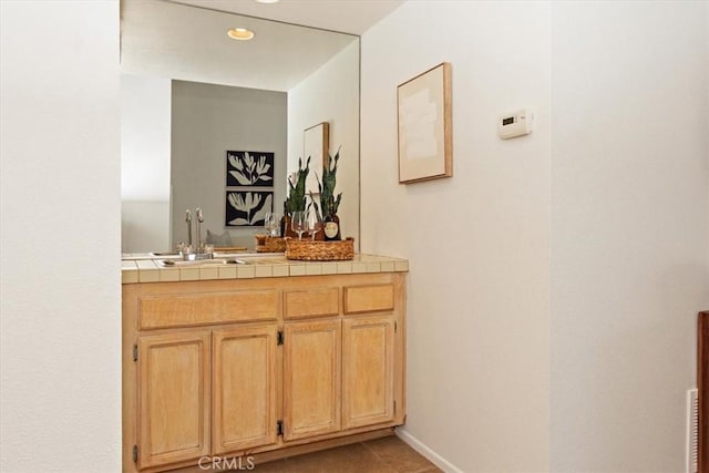 233 Lake Shore Dr, Rancho Mirage, CA 92270 - bathroom with vanity, recessed lighting, and baseboards