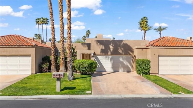 233 Lake Shore Dr, Rancho Mirage, CA 92270 - view of front of house featuring stucco siding, a front yard, and a tiled roof