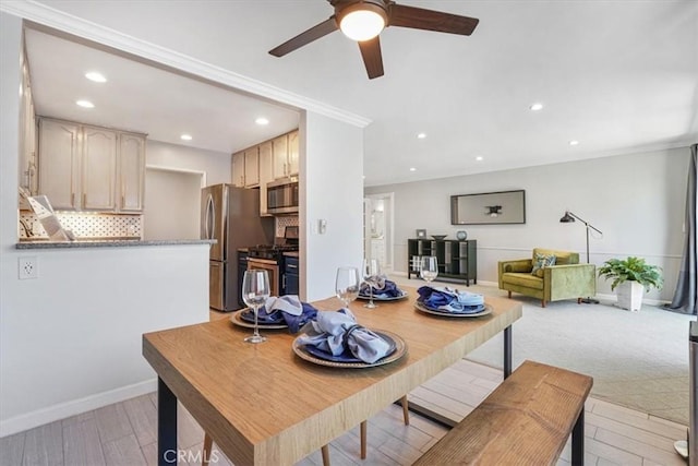 3649 Glendon Ave Unit 208, Los Angeles, CA 90034 - dining area with light wood-style floors, ceiling fan, and recessed lighting