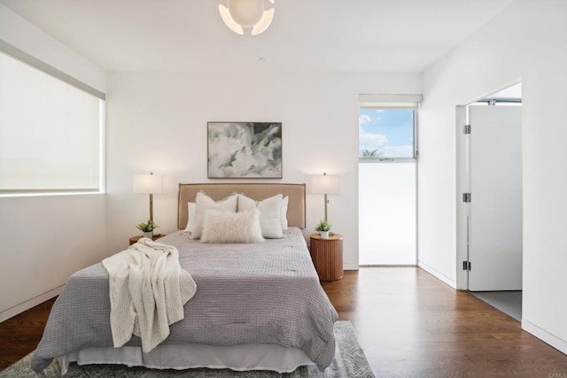 bedroom featuring wood finished floors
