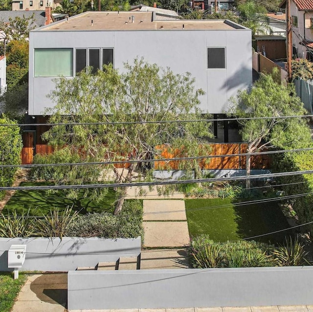 view of community with fence