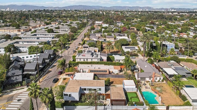 bird's eye view featuring a residential view and a mountain view