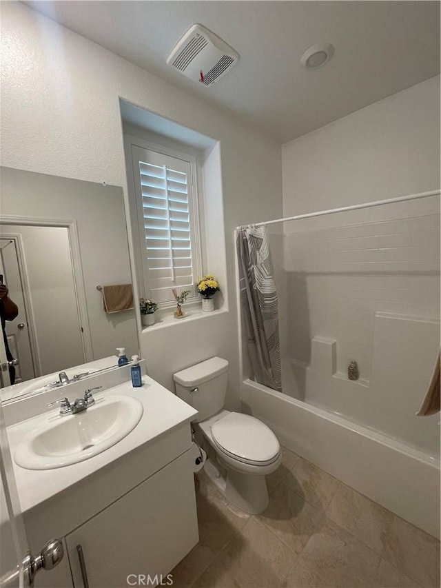bathroom with toilet, shower / bath combination with curtain, vanity, and tile patterned flooring