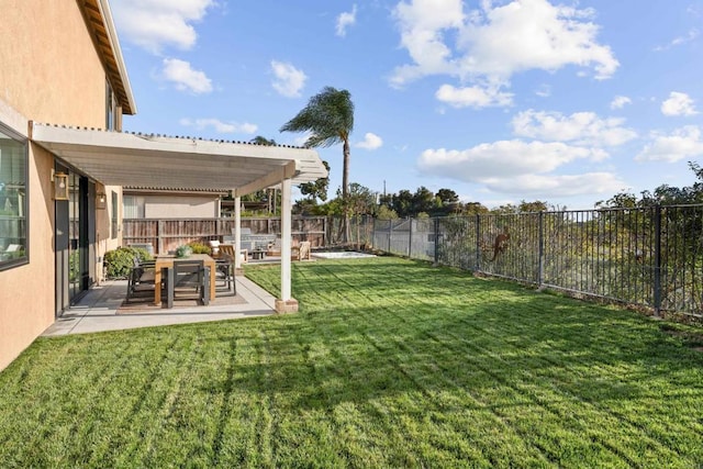 view of yard with a fenced backyard and a patio