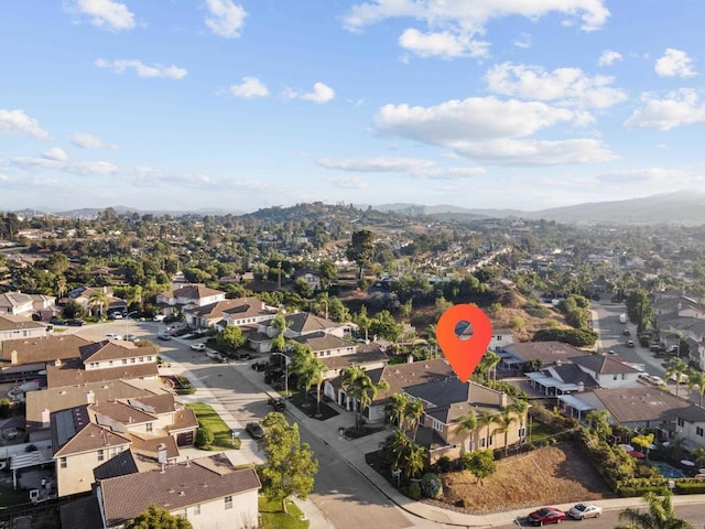 drone / aerial view with a mountain view and a residential view