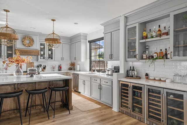 1890 Da Gama Ct, Escondido, CA 92026 - indoor dry bar featuring beverage cooler, decorative backsplash, stainless steel dishwasher, pendant lighting, and recessed lighting
