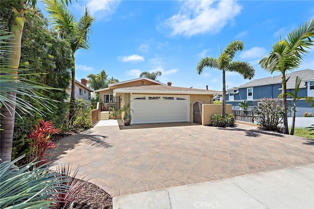 34501 Calle Carmelita, Dana Point, CA 92624 - single story home with stucco siding, a garage, fence, and decorative driveway