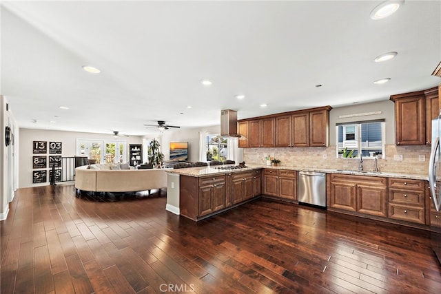 34501 Calle Carmelita, Dana Point, CA 92624 - kitchen with backsplash, dark wood-style flooring, a sink, and stainless steel dishwasher
