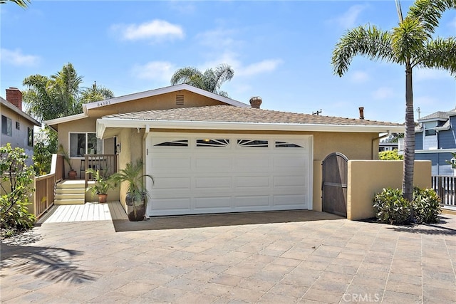 34501 Calle Carmelita, Dana Point, CA 92624 - ranch-style home featuring stucco siding, decorative driveway, a garage, and fence